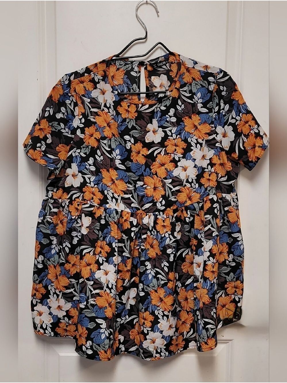 Floral Short-Sleeve Peplum Top in Black and Orange